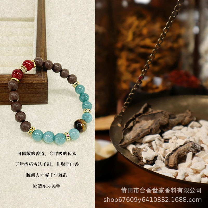Osmanthus & Herbal Harmony: Handcrafted TCM Aromatic Bracelet (He Xiang Zhu)